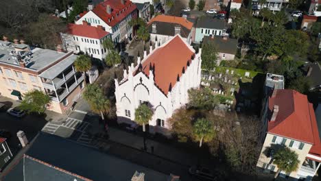 a drone shot of the french huguenot church in downtown charleston south carolina