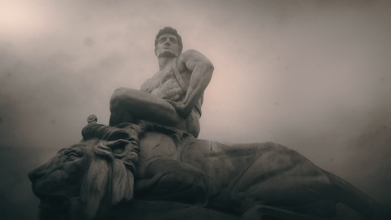 Epic, ancient stone statue on cloudy day and windy weather.