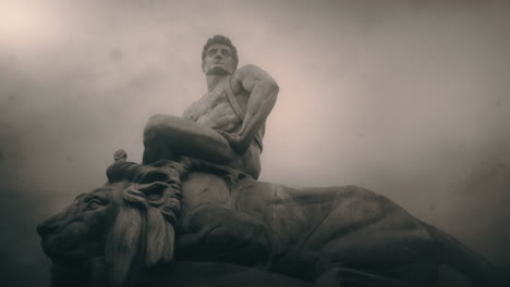 epic, ancient stone statue on cloudy day and windy weather.