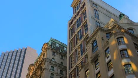 facade of a historical skyscraper at midtown manhattan neighbourhood in new york city, usa