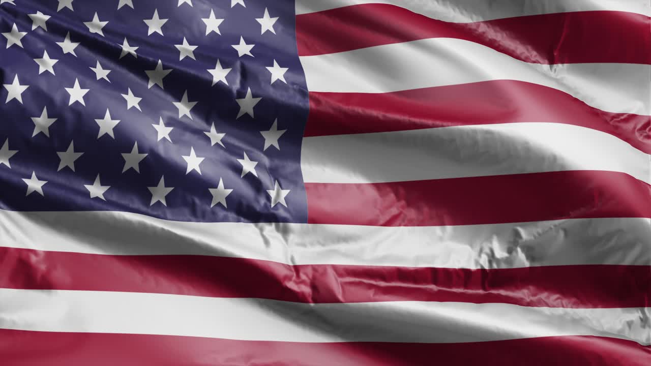 Flag of USA waving on sun. Seamless loop with highly detailed fabric texture. Loop ready in 4k resolution. 3D video