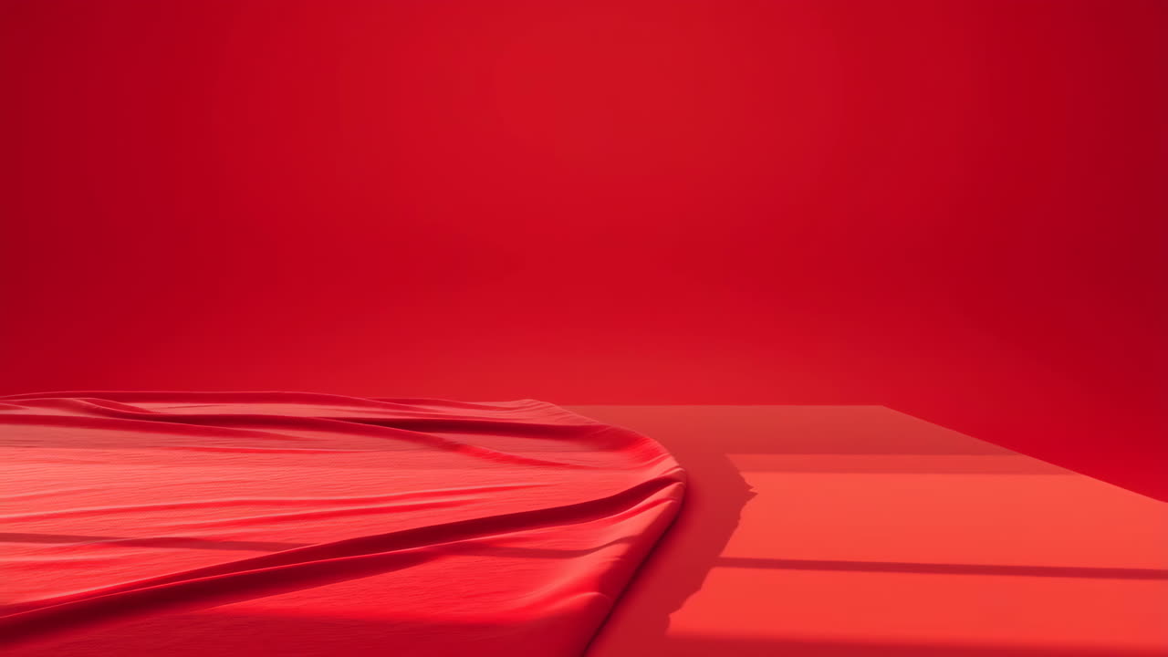 Red Fabric Drape on Monochromatic Background