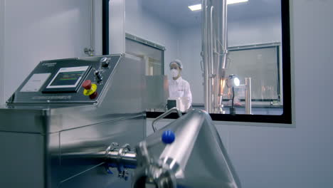 biotechnology laboratory with scientist or researcher scientists in lab coats performing a biological experiment, advanced equipment for analysis