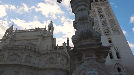 a stunning view of seville cathedral's tower in spain, featuring its ornate architecture