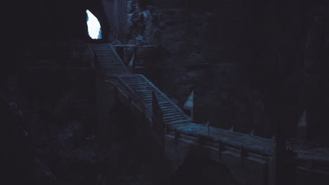 mysterious stone stairs lead to a bright opening in a dark cavern