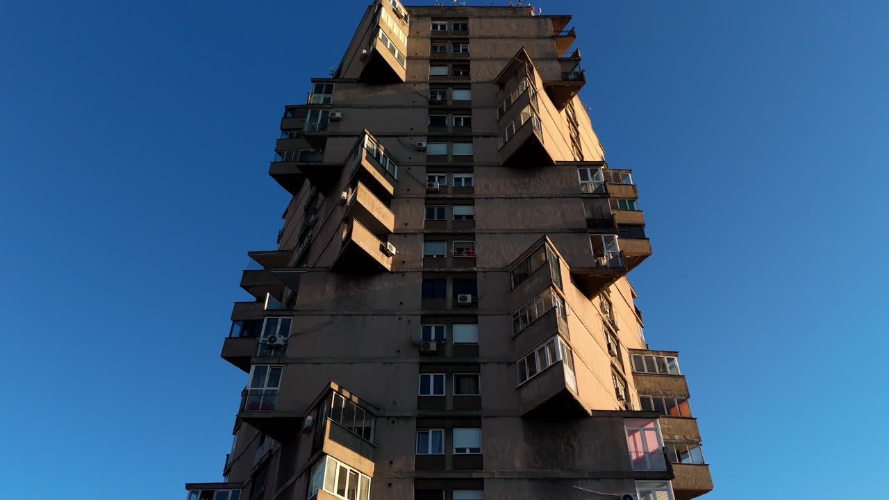 Drone footage of Karaburma Tower in Belgrade, Serbia iconic Yugoslav-era brutalist apartment block representing socialist architecture and postmodern urban design