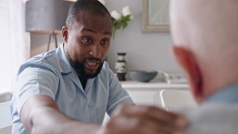 caregiver supporting a senior man