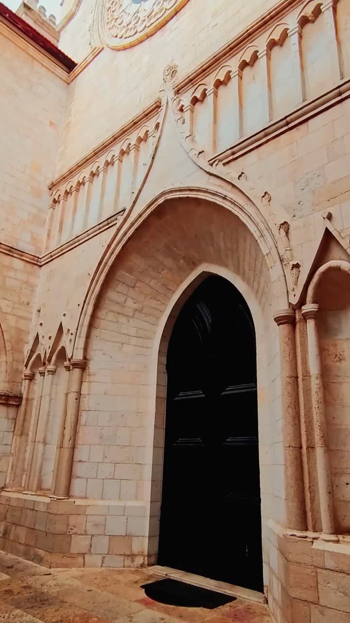 Gothic Arched Entrance to a Historic Church in Jerusalem