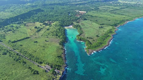 aerial top down of hidden playa diamante beach during sunny day on dominican republic. exotic landscape in summer season.