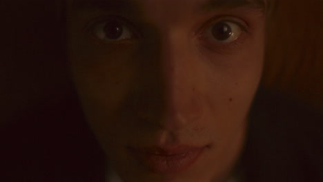 close-up portrait of young handsome man looking into camera