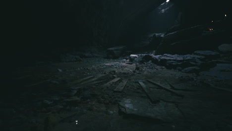 mysterious underground cave with dim lighting revealing rocky terrain