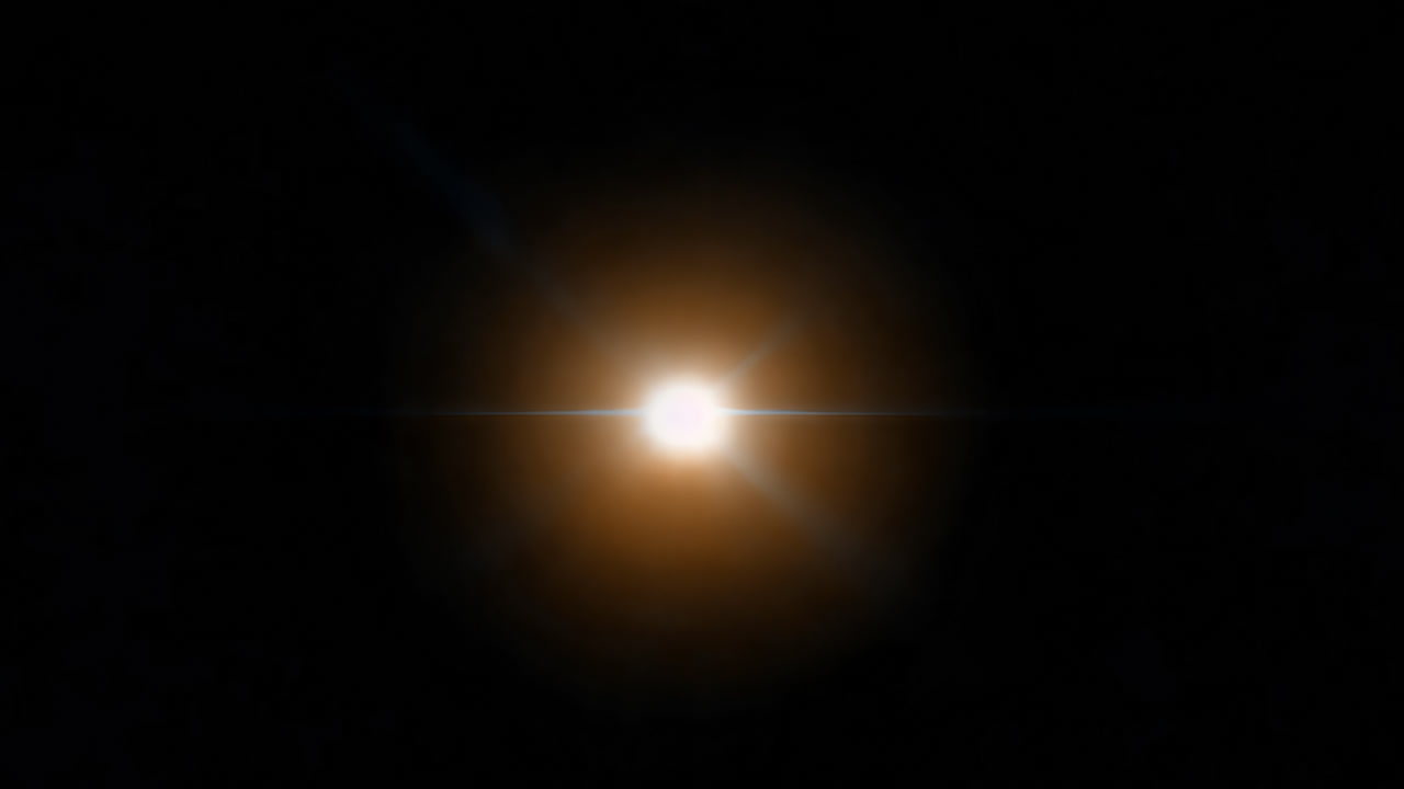 Bagliore dell'obiettivo luminoso e pulsante su sfondo nero