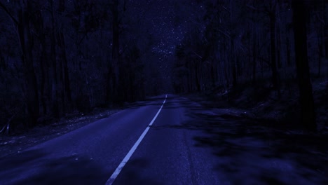 rear facing night driving point of view pov for interior car scene green screen replacement - night time footage under a clear starry sky, on quiet long straight deserted country road