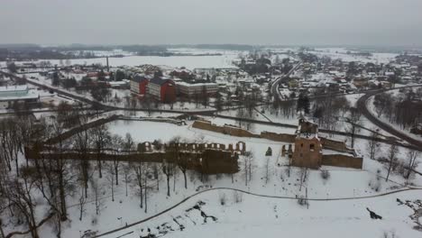 Ruins-of-Ancient-Livonian-Order's-Stone-Medieval-Castle-Latvia-Aerial-Drone-Top-Shot-From-Above