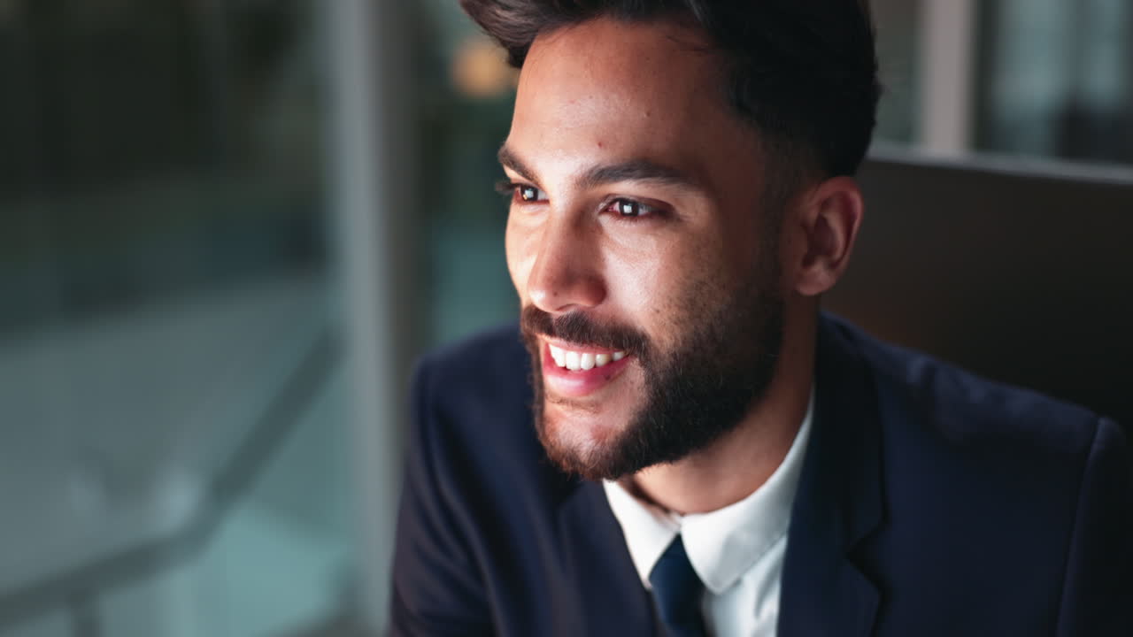 Portrait of a smiling businessman in a suit