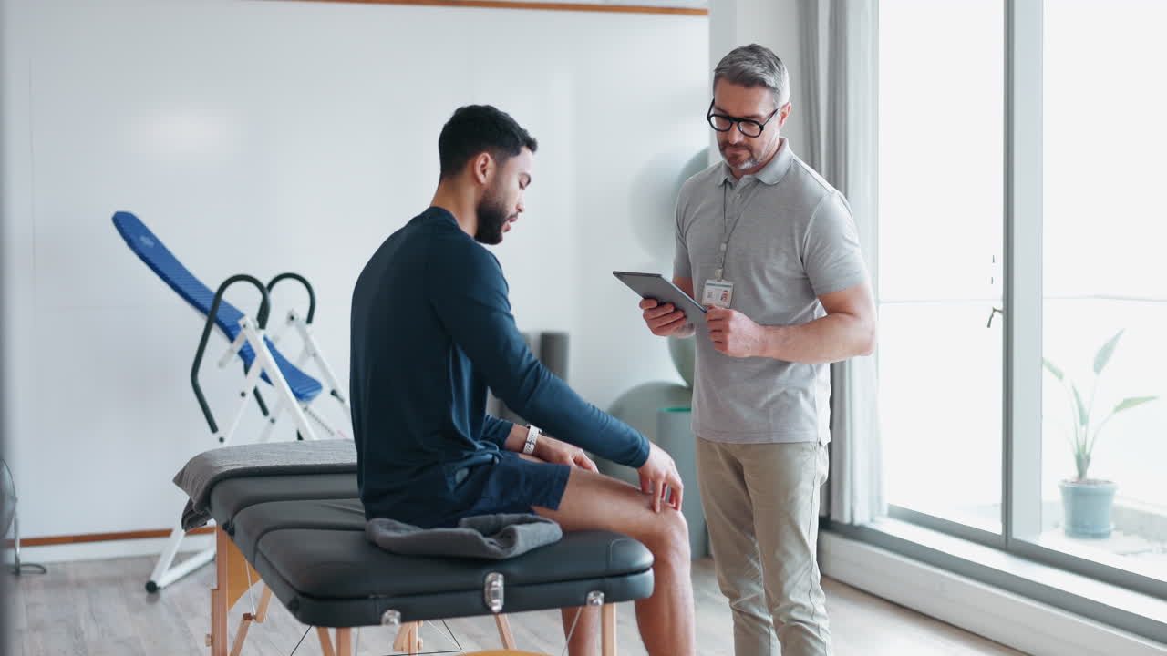 Physiotherapist, man and consultation for joint