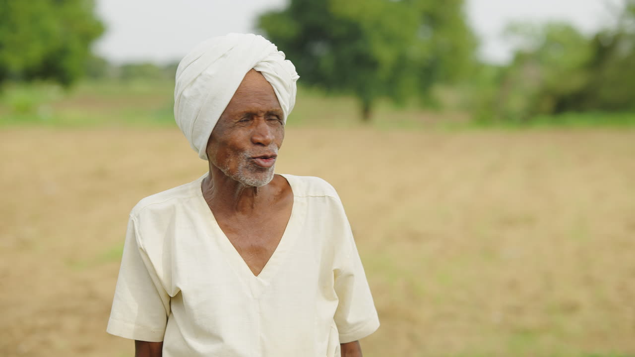Portraits of Elderly Indian Farmer in Traditional Turban