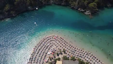 people enjoying their vacations on the beach of oludeniz on the turquoise coast of turkey