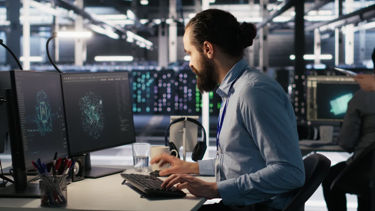 Vertical video Data center system administrator talking with coworker in office