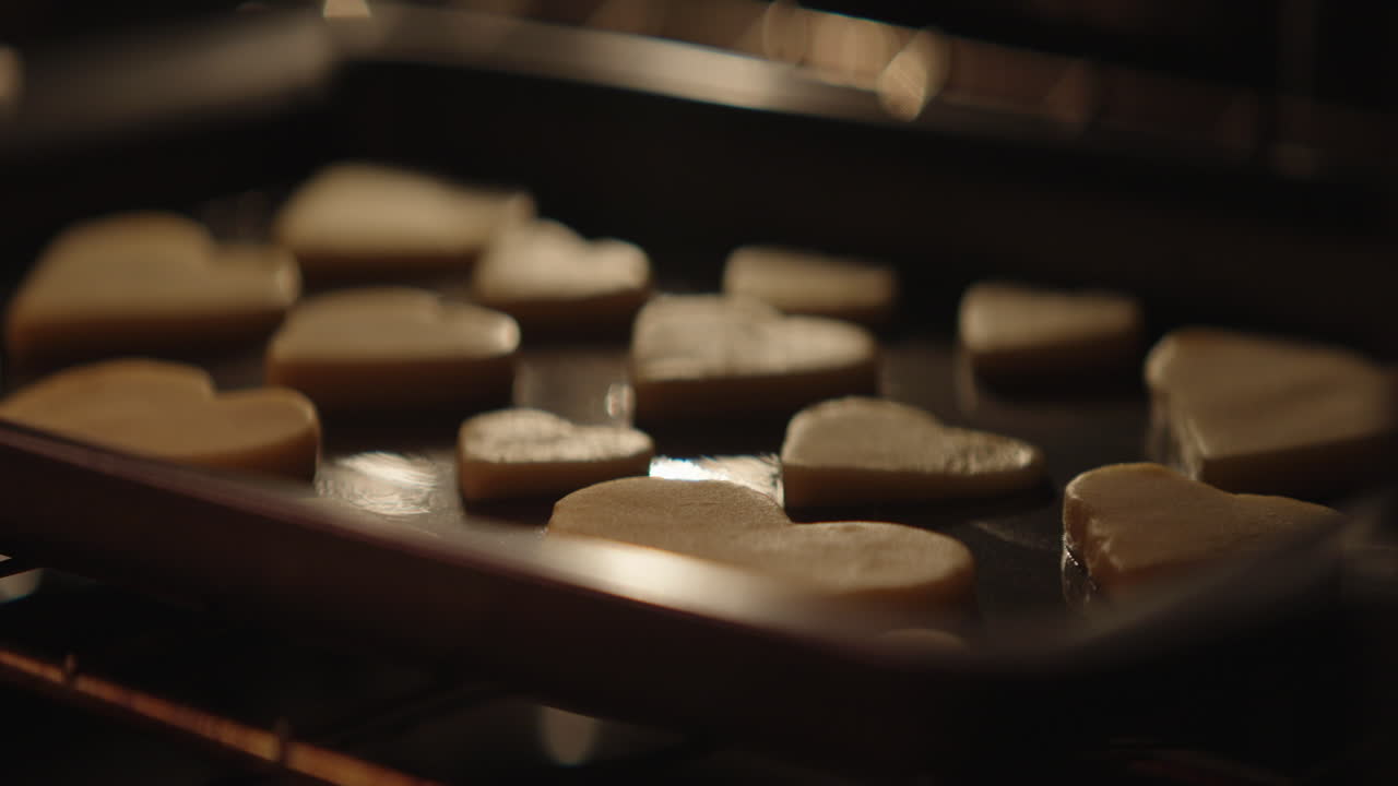 Heart-shaped cookies baking in the oven