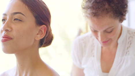 young-mixed-race-woman-having-an-acupuncturist