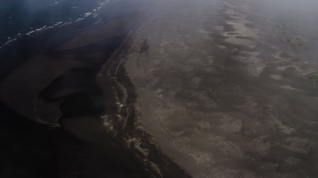 AERIAL - Beautiful coastline in Hvitserkur,Vatnsnes, Iceland, wide shot forward