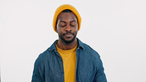 heart, hands and face of black man in studio
