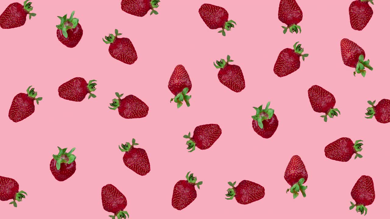 patrón de animación de bucle sin costuras de fresas rojas que se mueven en un fondo rosado. hermosas bayas jugosas es un concepto de cosecha y verano. plantilla para publicidad con espacio de copia