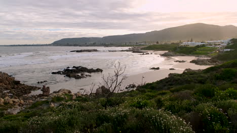 scenic golden hour sunset wide view over hermanus beach and coastline