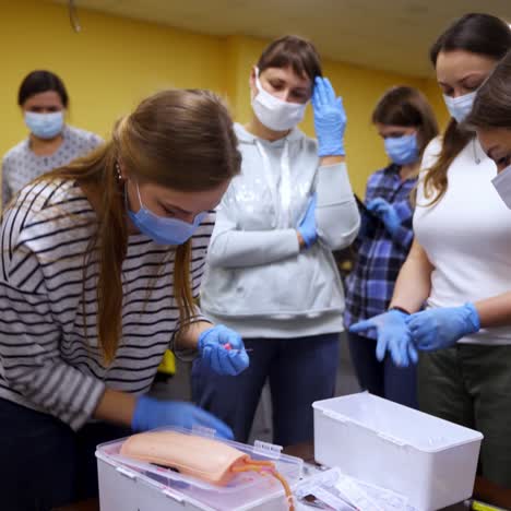 doctor teaching first aid