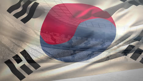 bandera coreana ondeando frente al estadio