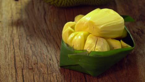 jackfruit is delicious tropical fruits, jackfruit is an exotic fruit grown in tropical regions of the world on wooden table with copy space.