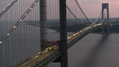 aerial view of the verrazzano-narrows bridge at night. shot in brooklyn looking towards staten island