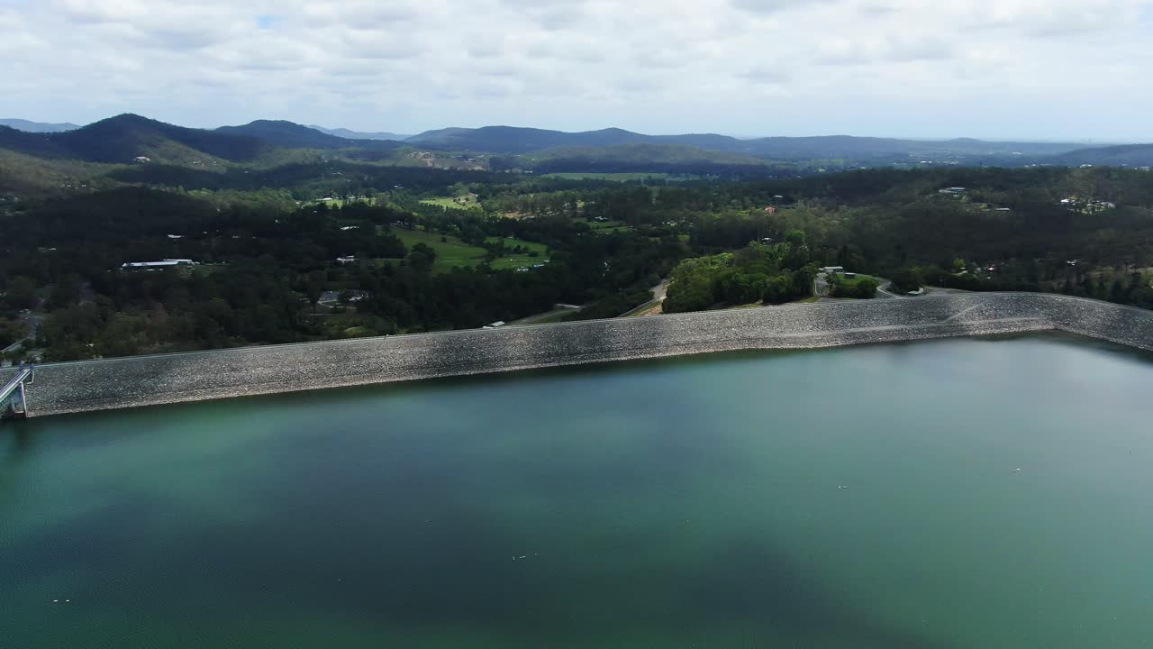 Hinze dam with Gold Coast hinterland in the distance, Calm summers day