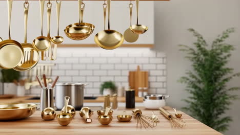 a collection of golden kitchen utensils and cookware