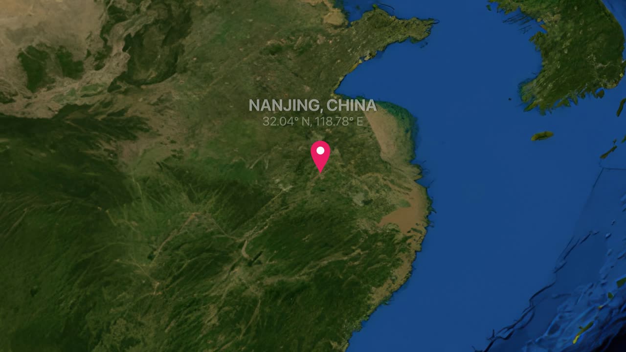 A digital earth render zooms from a global map into Nanjing China with location markers