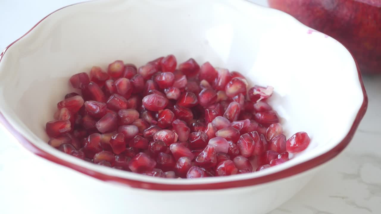 Pomegranate Seeds in a Bowl