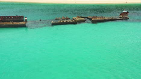 Magnificent-clear-water-diving,-Moreton-Island-Wrecks,-Queensland-Australia,-Low-fly-drone-footage