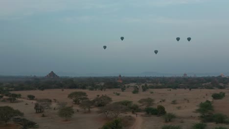 amazing scenery at famous bagan temple location in myanmar with balloons