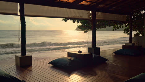 bean-bag-on-balcony-with-sea-beach-background-at-sunrise-or-sunset-time