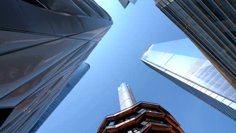 looking up at skyscraper buildings in new york city in 4k slow motion 60fps