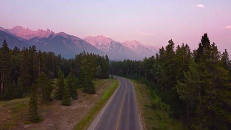 mountain with road and a car