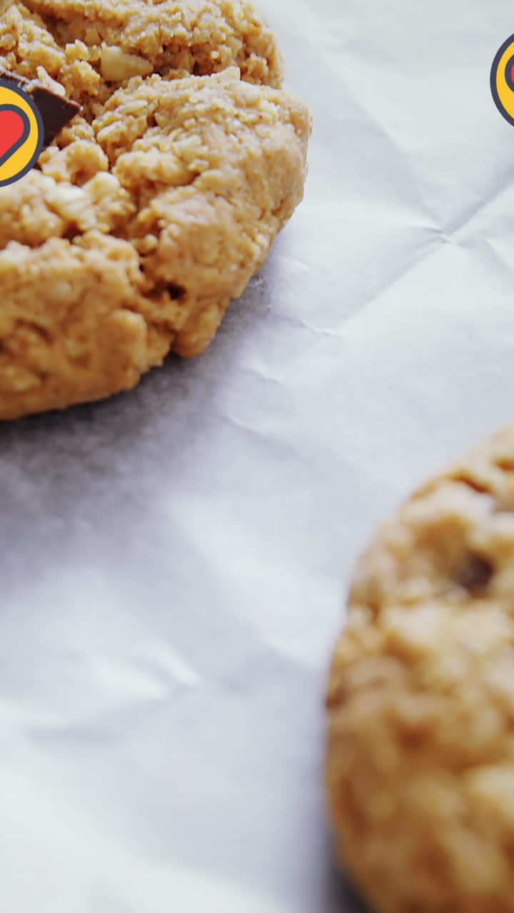 Animation of hearts floating over cookies on cooking paper