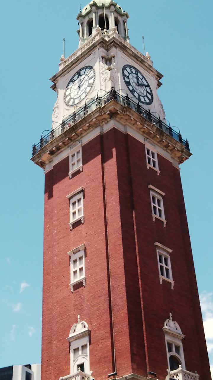 Low angle Vertical of Clock Monumental Tower, landmark of Buenos Aires Argentina