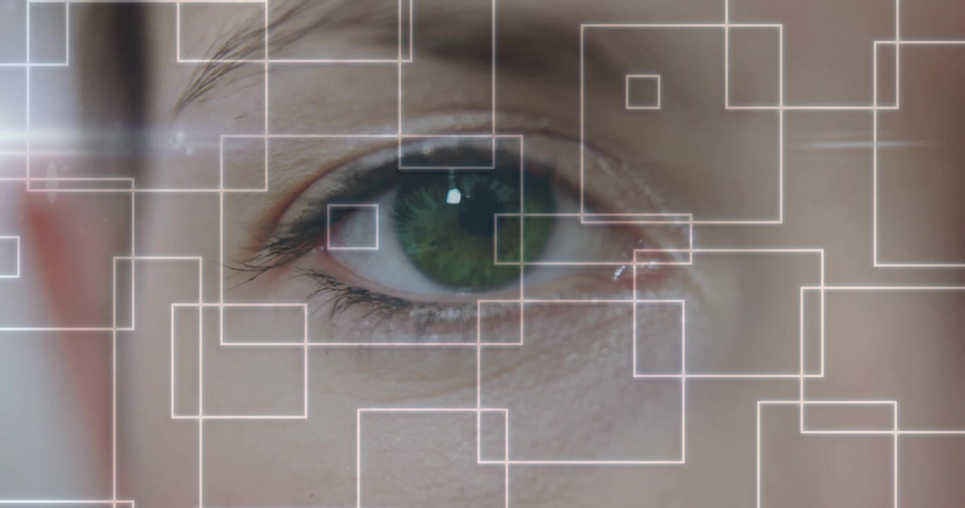Woman showing green eye scanning in technology interface, displaying semi-transparent grid overlay