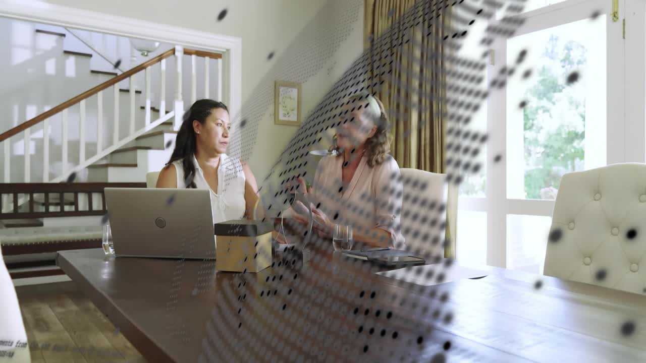 Right woman grabbing device, pair comparing phone with laptop, overlay showing data for tech setup