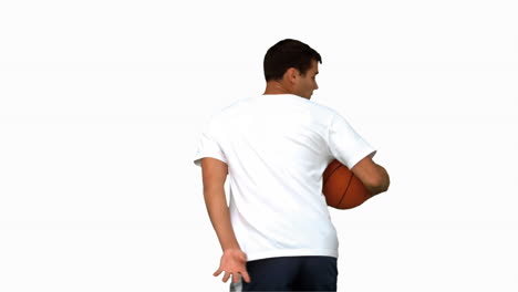 hombre driblando con una pelota de baloncesto en una pantalla blanca