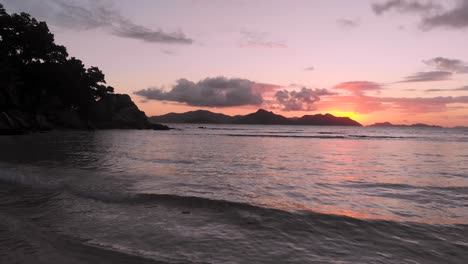 beautiful sunset on la digue, an island of the seychelles