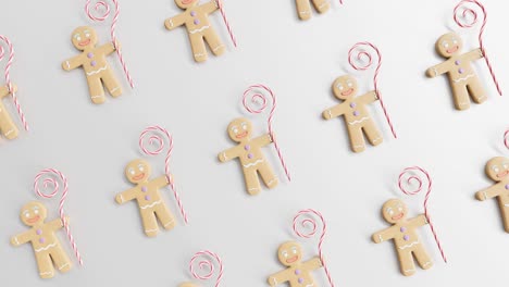 gingerbread men and candy canes on a white background