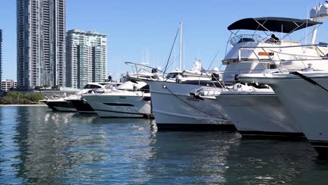 yachts and boats docked at a marina